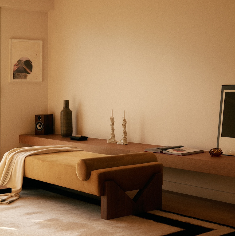Chambre rénovée : console murale filante en bois, banquette velours, teintes chaudes